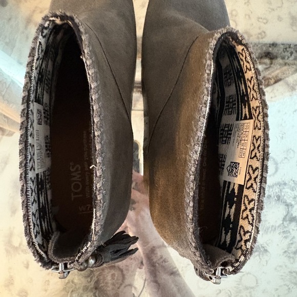 Maude Forged Iron Suede Wedge Boot – TOMS.com TOMS Shoes Womens Size 7.5 Gray Suede Booties Block Heel Ankle Zip Tassel Detail
